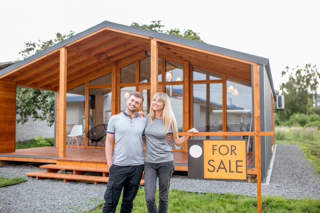 couple near the house for sale 2021 12 09 08 30 36 utc