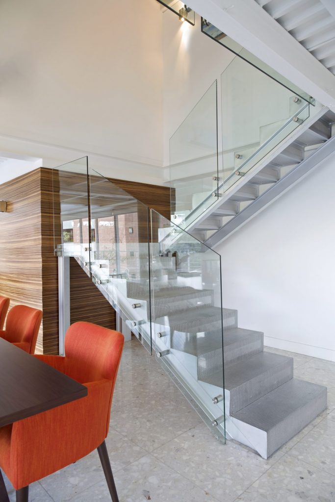 view of stairs and dining room inside modern and l 2022 05 09 23 39 02 utc