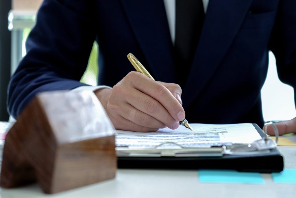 loan officers are signing approving funds to buy h 2021 08 26 17 53 53 utc