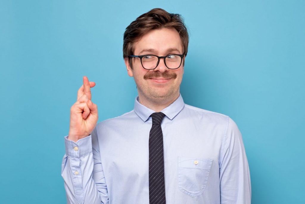 businessman with crossed fingers is a true liar 2022 12 01 21 07 08 utc