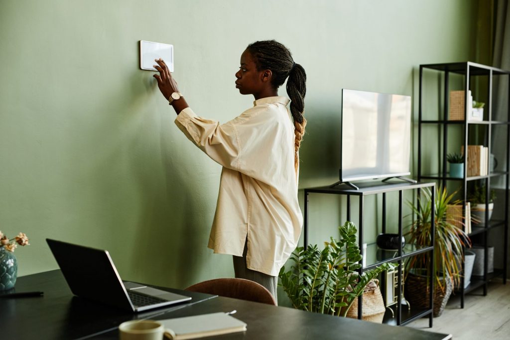 woman operating smart home system 2022 03 09 03 01 47 utc